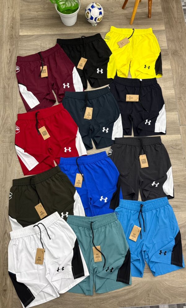 UNDERARMOUR DOUBLE SIDE ZIPPER SHORTS