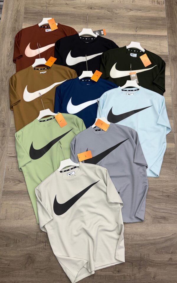 NIKE BIG SWOOSH OVER SIZED TSHIRT