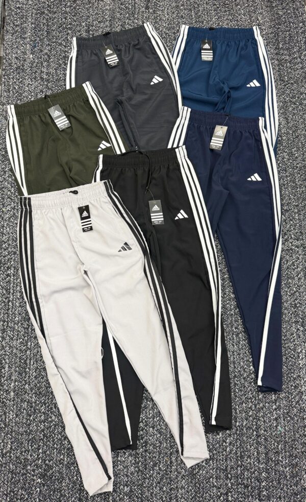 ADIDAS THREE STRIPES BAGGY FIT TRACKPANT