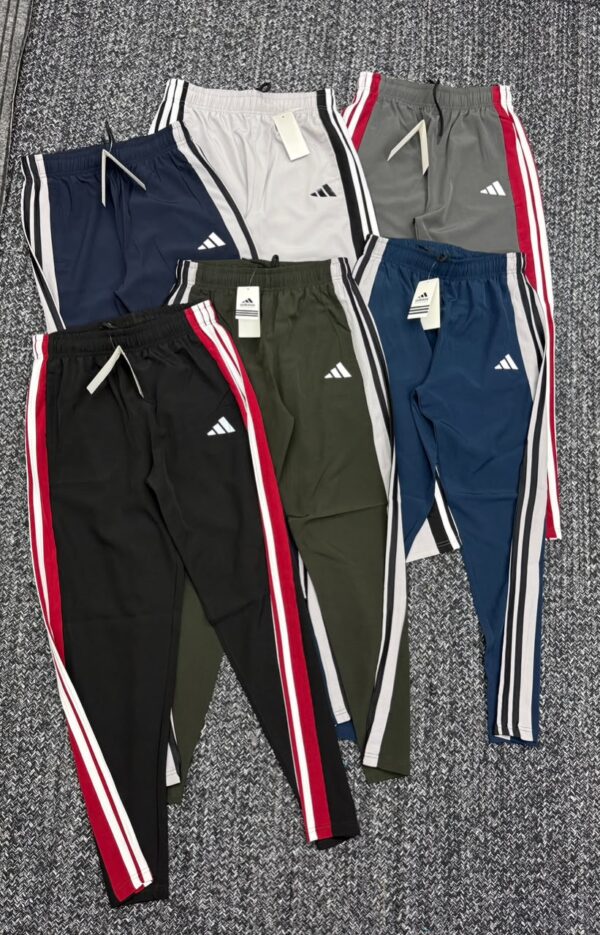 ADIDAS THREE STRIPES BAGGY FIT NETFOLDING TRACKPANT