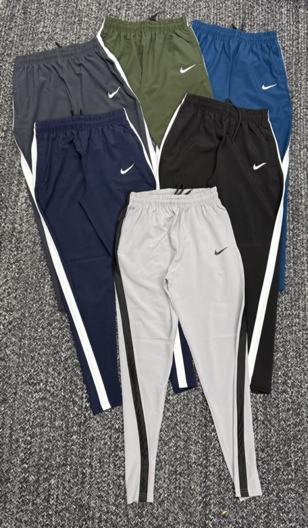 NIKE ECONOMIC SINGLE STRIPES TRACK PANT