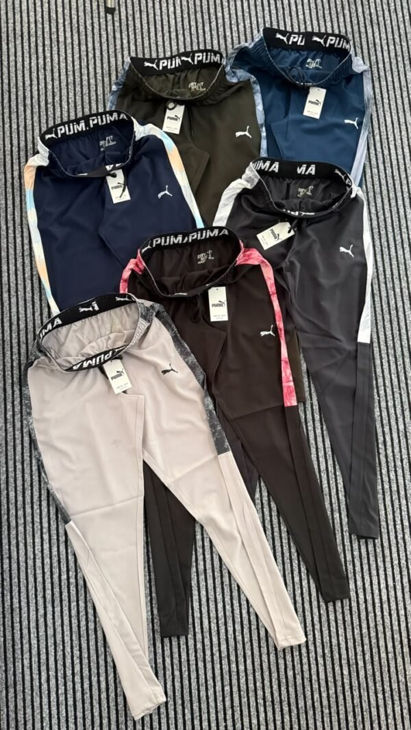 PUMA PRINTED NS LYCRA WITH CUT AND SEW PRINT ON SIDE TRACK PANT